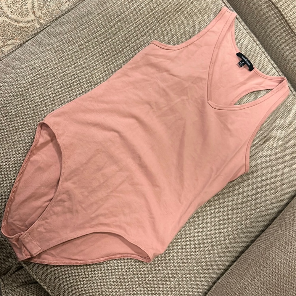 Pink body suit